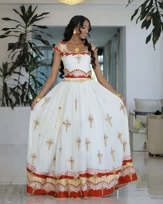 Celebrating Love in Red Ethiopian Couples Outfit: Regal Matching Habesha Couples Outfit